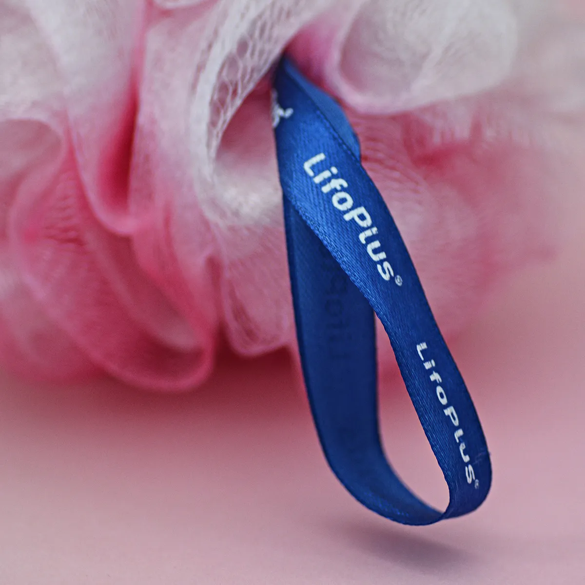 Lifoplus badspons tweekleurig fuchsia voor zachte huid
